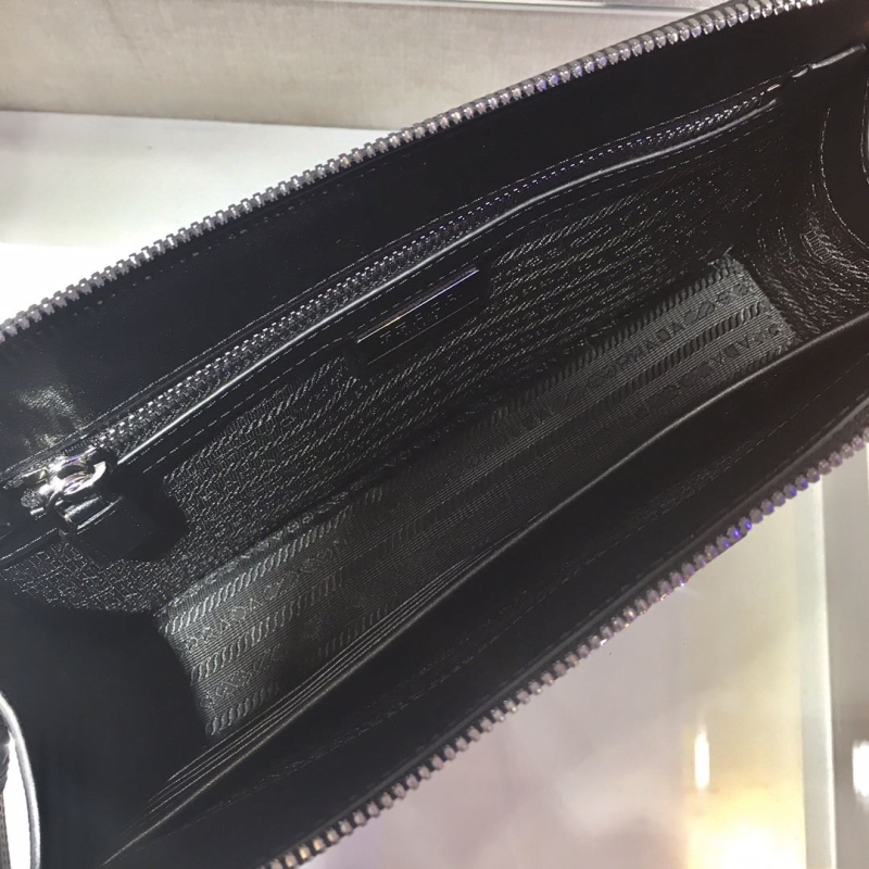 Pra*a clutch bags